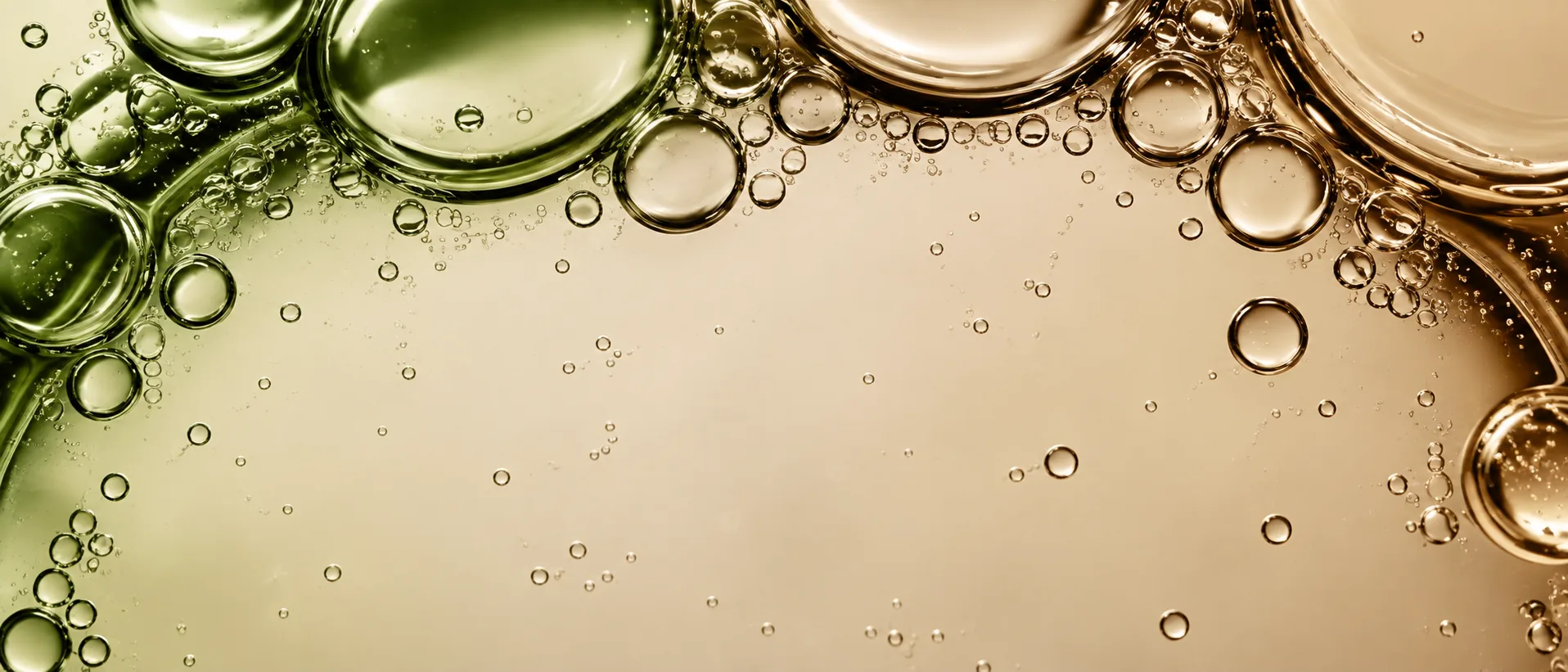 Macro texture of golden oil droplets